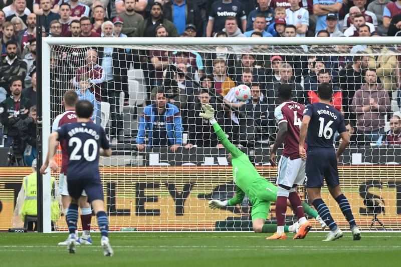 West Ham goalkeeper Lukasz Fabianski cannot stop Jack Grealish scoring for City. AFP