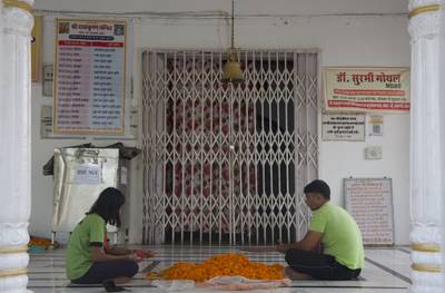 Some students gather outside temple during lunch breaks or in the evenings after leaving a coaching centre, where they can study for up to six hours at a time
