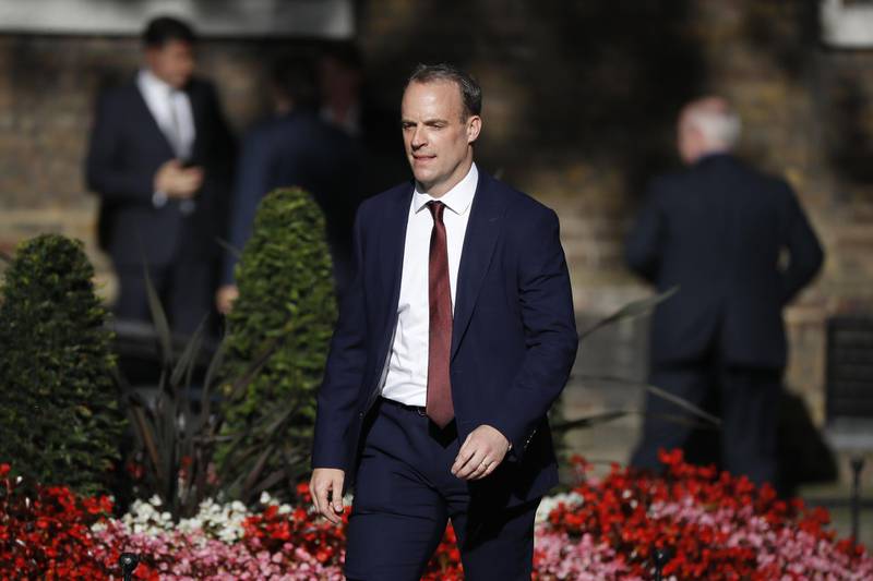 Conservative party politician Dominic Raab arrives at 10 Downing Street in London on July 24, 2019.  Boris Johnson took over as Britain's new prime minister on Wednesday vowing to prove the "gloomsters" wrong and get a new deal to leave the European Union on October 31 -- or exit without one. / AFP / Tolga AKMEN
