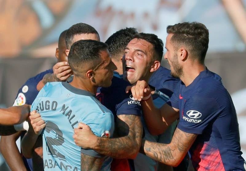 Celta de Vigo's Iago Aspas scuffles with Atletico Madrid players during the La Liga match at the Estadio de Balaídos on Sunday, August 15. Atletico won the match 2-1. EPA