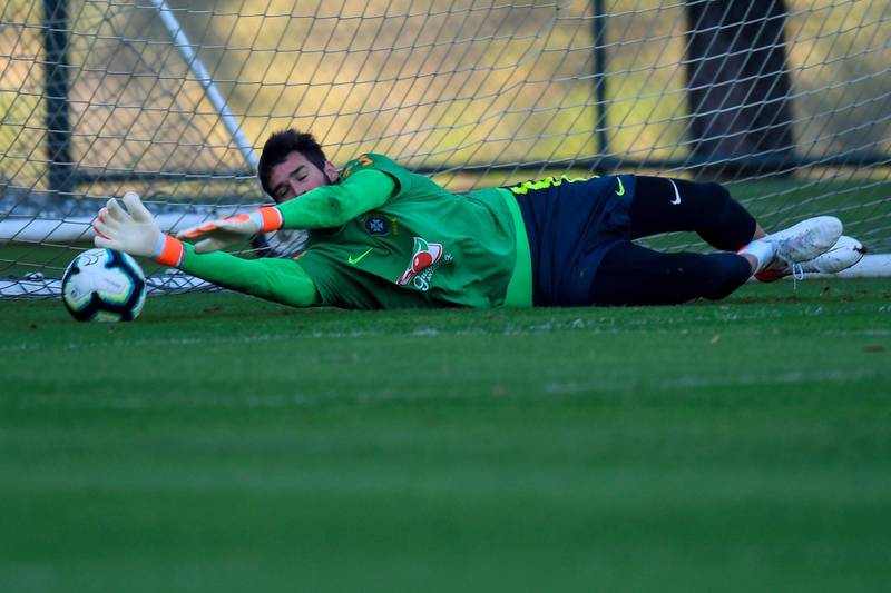 Brazil goalkeeper Alisson makes a save. EPA