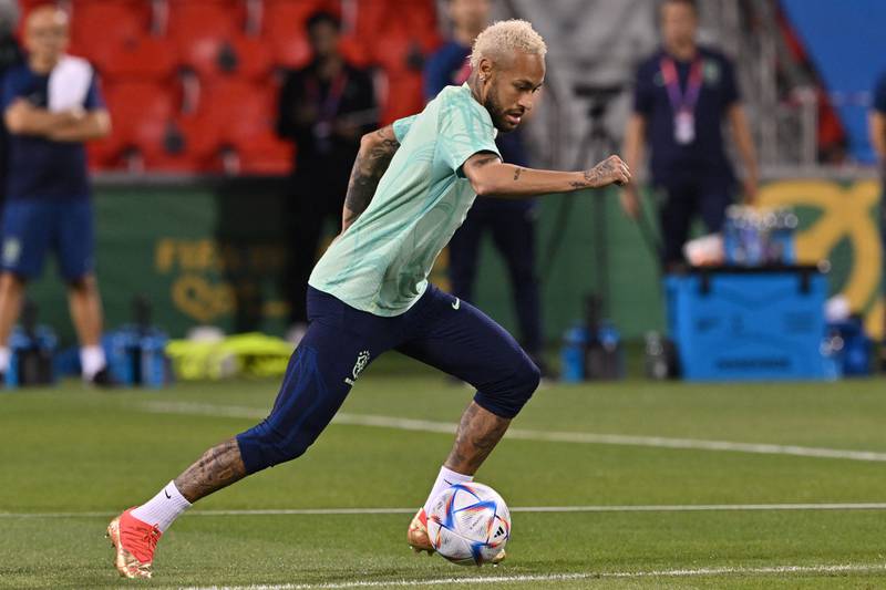 Neymar takes part in the training session. AFP