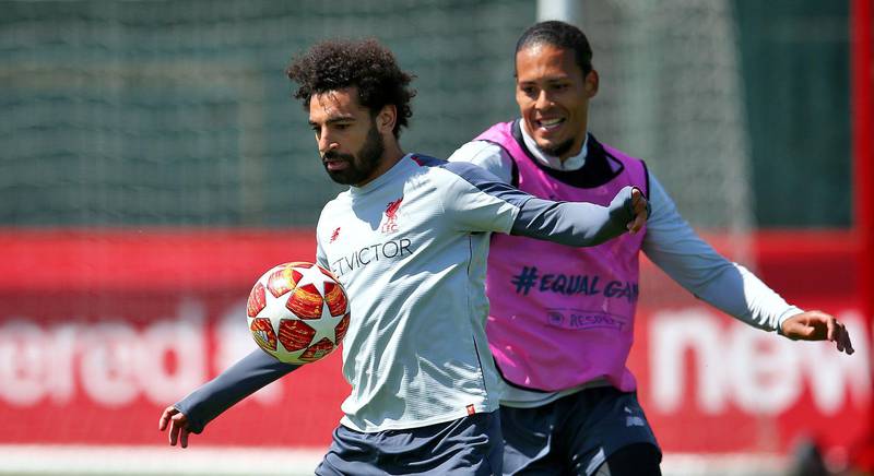 Liverpool's Mohamed Salah (left) and Virgil van Dijk during training. PA Wire.