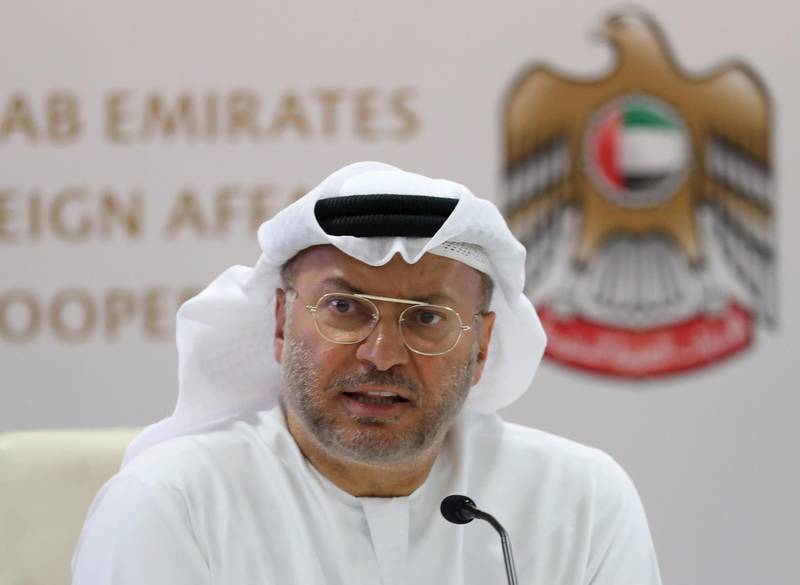 Emirati minister of state for foreign affairs, Anwar Gargash, speaks during a press conference in Dubai about the situation in Yemen on August 13, 2018. - The United Arab Emirates, Riyadh's main partner in the Saudi-led military coalition battling Huthi rebels in Yemen, says it is also determined to wipe out Al-Qaeda in the country's south. (Photo by KARIM SAHIB / AFP)