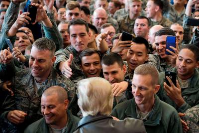 US president Donald Trump greets US troops after speaking during an event with US military personnel at Yokota Air Base at Fussa in Tokyo. Jim Watson / AFP Photo