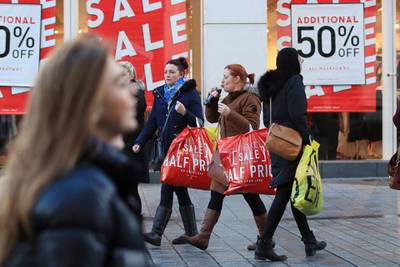 Shoppers take advantage of the Boxing Day sales in Liverpool city centre, England, Tuesday, Dec. 26, 2017. (Peter Byrne/PA via AP)