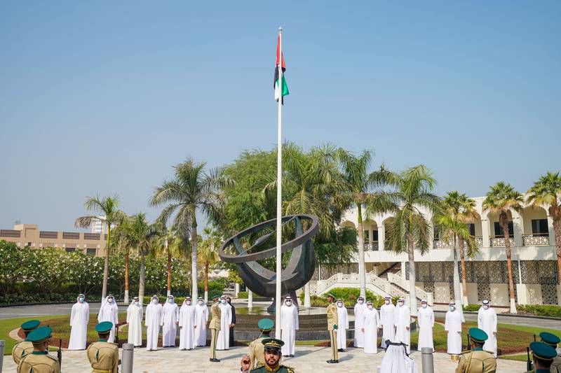 Sheikh Maktoum bin Mohammed hoists the flag at Dubai Rulers court in celebration of UAE flag day. Photo: Dubai Media Office