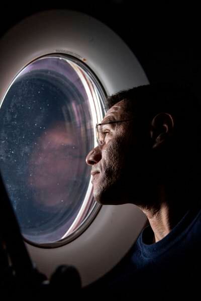 Mr Rubio peers out of a window aboard the SpaceX Dragon Freedom spacecraft docked to the ISS. AP