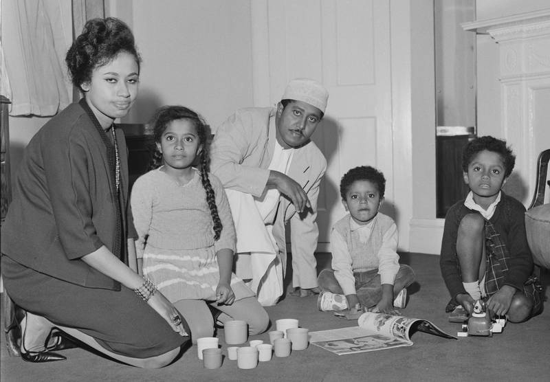 Jamshid bin Abdullah, the last Sultan of Zanzibar, in exile with his wife Sheikha Anisa bint Salim Al Said and children at the St James' Hotel, London, after the Zanzibar Revolution, 21st January 1964.  (Photo by Robertson/Express/Hulton Archive/Getty Images)