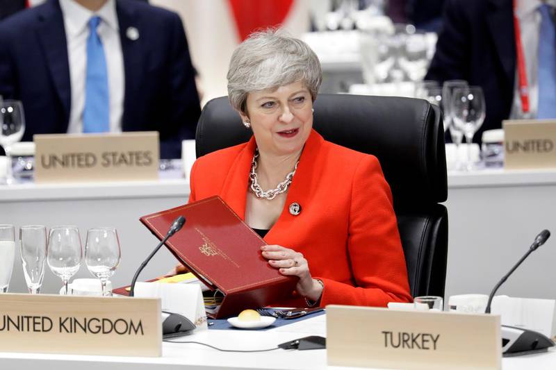 British Prime Minister Theresa May attends a working lunch during what will be her final G20 summit. EPA