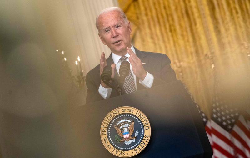 US President Joe Biden responds to questions about the ongoing US military evacuations of US citizens and vulnerable Afghans, in the East Room of the White House in Washington. AFP