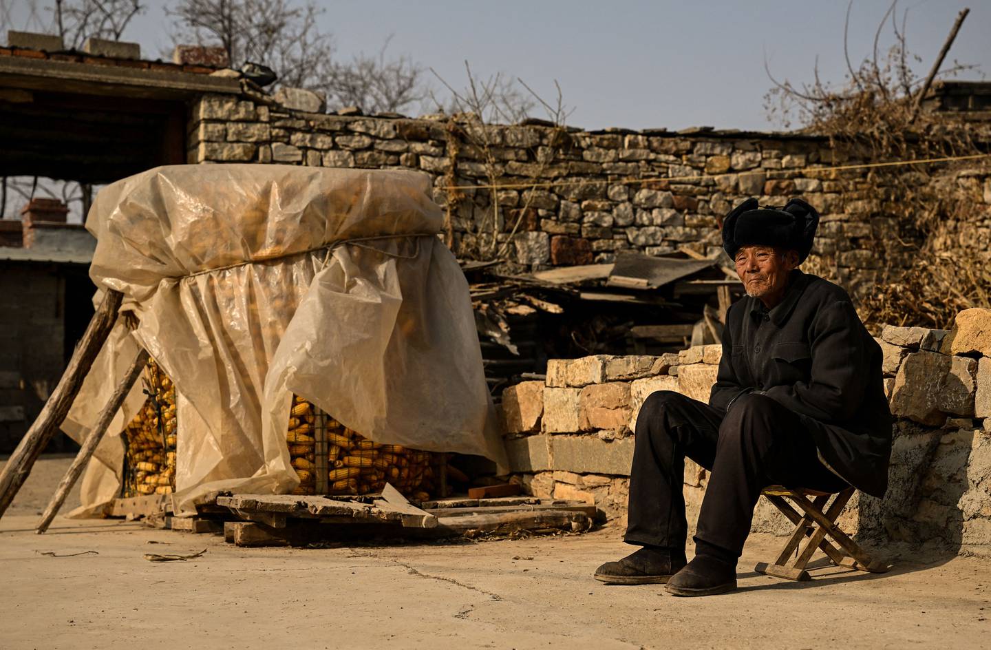 An elderly man enjoys the sunshine in Tai'an, Shandong province, China.  AFP