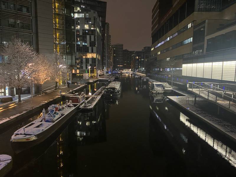 Snow-covered barges in Paddington, west London. PA
