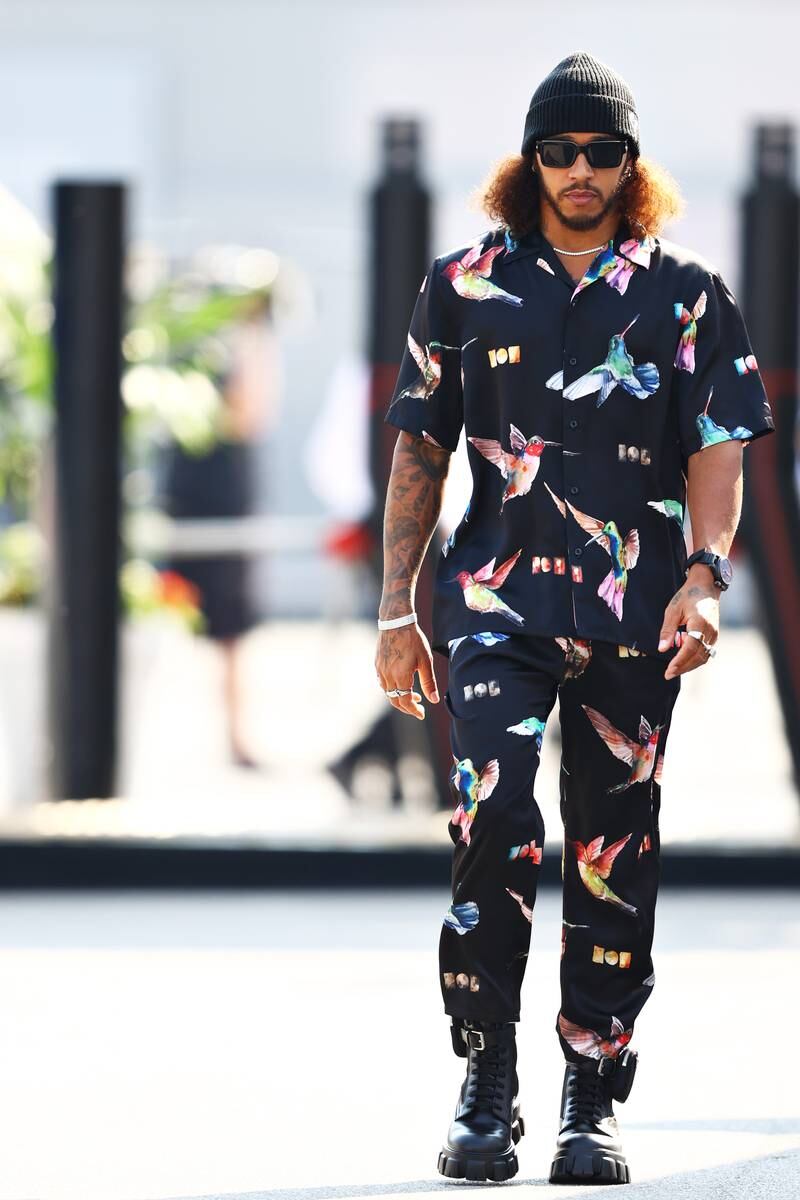 Lewis Hamilton, in a bird-print set by Nahmias, walks in the paddock ahead of the F1 Italian Grand Prix at Autodromo di Monza on September 12, 2021, in Monza. Getty Images