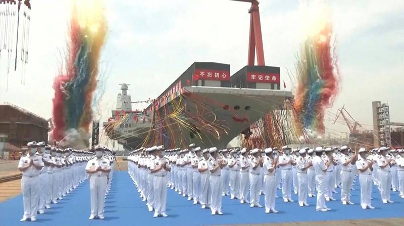 The launch ceremony of the 'Fujian', a People's Liberation Army aircraft carrier, at a shipyard in Shanghai. AFP / Screengrab from CCTV video
