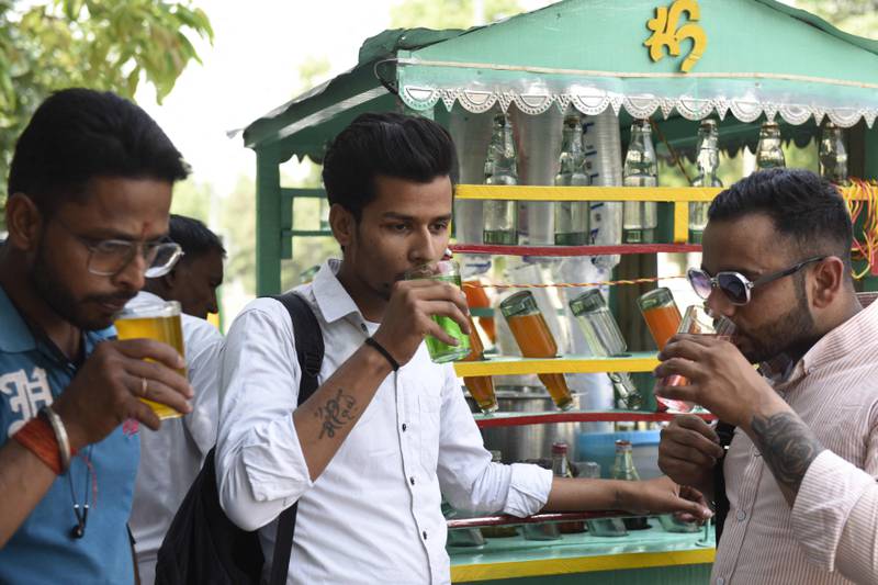 Cold drinks are enjoyed on a hot summer day in Amritsar. AFP