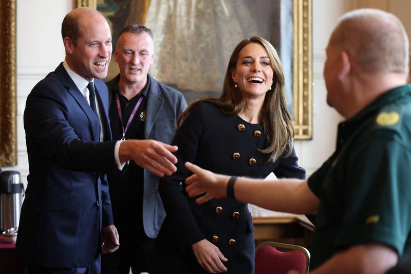 Prince William and Catherine, Princess of Wales thanked volunteers and staff who worked on the funeral of Queen Elizabeth, at Guildhall in Windsor on Thursday. AFP
