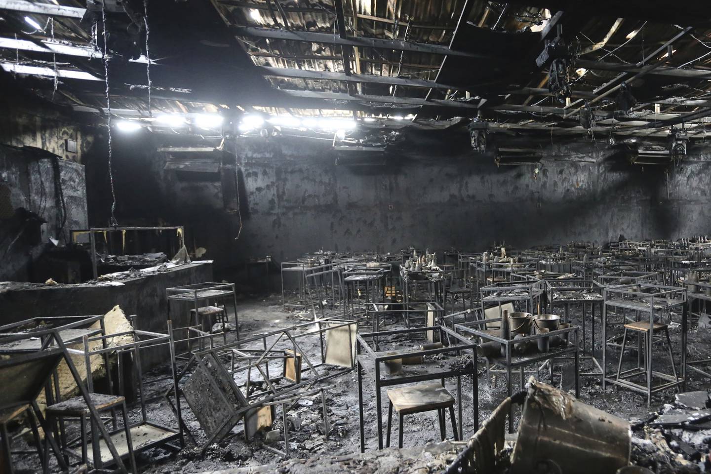 The charred interior of the Mountain B pub in Thailand's Chonburi province.  AP Photo