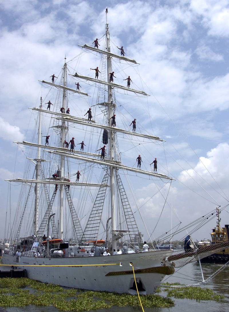 India's National Defence Academy cadets climb the mast of a training ship before their departure from Cochin port, in the southern part of the country. Reuters