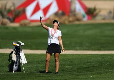 Maria Lopez Castro, caddie of Alvaro Quiros of Spain catches a ball. Getty Images