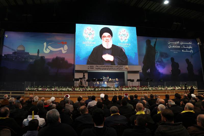 Supporters of Hezbollah attend a televised speech by the group's leader Hassan Nasrallah in Beirut. AFP