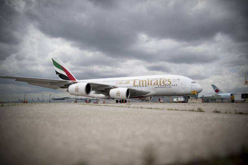 An Airbus SE A380-800 Emirates plane sits parked at Toronto Pearson International Airport (YYZ) in Toronto, Ontario, Canada, on Monday, July 22, 2019. In 2018, 49.5 million passengers traveled through Pearson on 473,000 flights. Photographer: Brent Lewin/Bloomberg