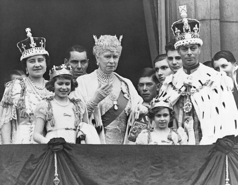 The Royal Family on the balcony at Buckingham Palace after the coronation of King George VI of England. Shown are (from left to right): Queen Elizabeth; Princess Elizabeth; Queen Mary the Queen Mother; Princess Margaret; and King George VI. (Photo by © Hulton-Deutsch Collection/CORBIS/Corbis via Getty Images)