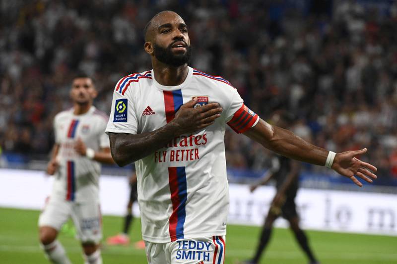 Lyon's French forward Alexandre Lacazette celebrates after scoring his team's second goal from the penalty spot. AFP