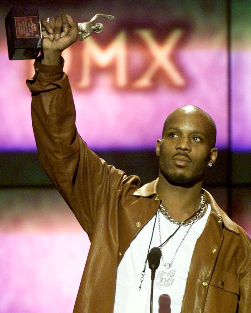 A March 4 2000 file photo shows rapper DMX at the 14th annual Soul Train Music Awards. Rapper DMX was charged June 25, 2004 with cocaine possession and criminal impersonation after trying to steal a car then crashing another vehicle through an airport parking lot gate, claiming he was a federal agent, prosecutors said. DMX, 33, whose real name is Earl Simmons, and a man police identified as Jackie Hudgins, 41, were arrested Thursday night at New York's Kennedy airport by police officers who found a billy club and a bag of crack cocaine in their sport utility vehicle, Queens District Attorney Richard Brown said. REUTERS/Gary Hershorn  JDP