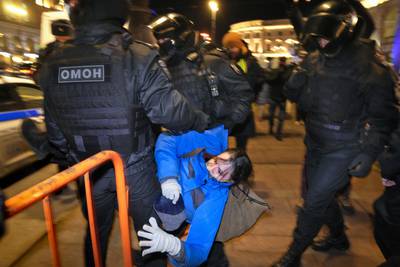 Police detain a demonstrator during a protest against Russia's incursion into Ukraine in St  Petersburg. AP