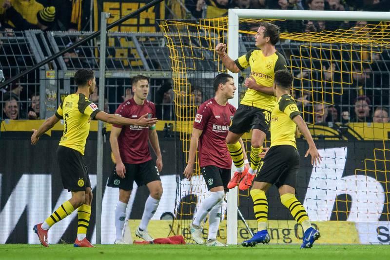 DORTMUND, GERMANY - JANUARY 26: Mario Goetze of Dortmund celebrates his goal during the Bundesliga match between Borussia Dortmund and Hannover 96 at the Signal Iduna Park on January 26, 2019 in Dortmund, Germany. (Photo by JÃ¶rg SchÃ¼ler/Getty Images)