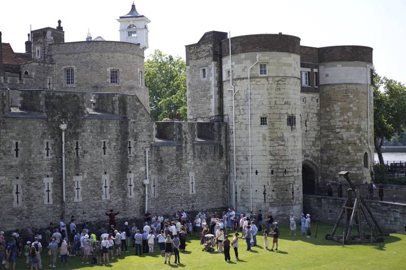 Tourists at the Tower of London. AP