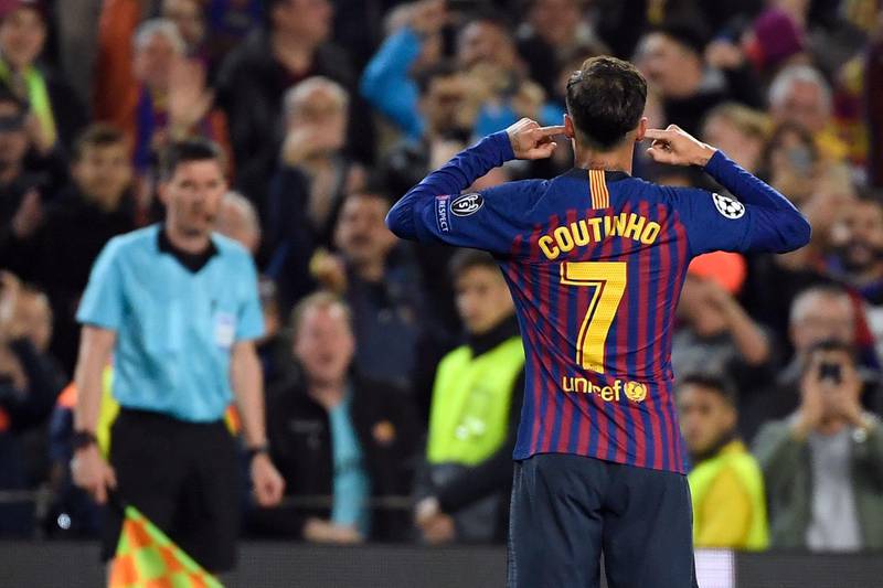 Barcelona's Brazilian midfielder Philippe Coutinho celebrates scoring his team's third goal. AFP