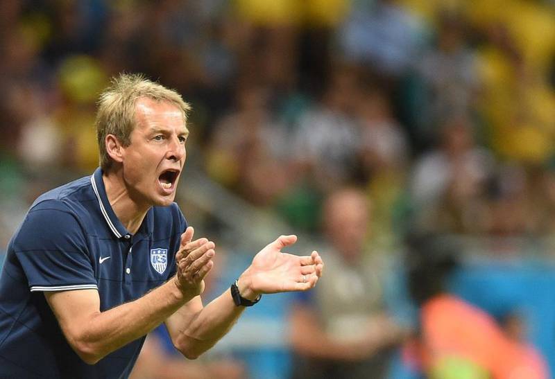 Jurgen Klinsmann brought the US to the knockout round of the 2014 World Cup. Francisco Leong / AFP