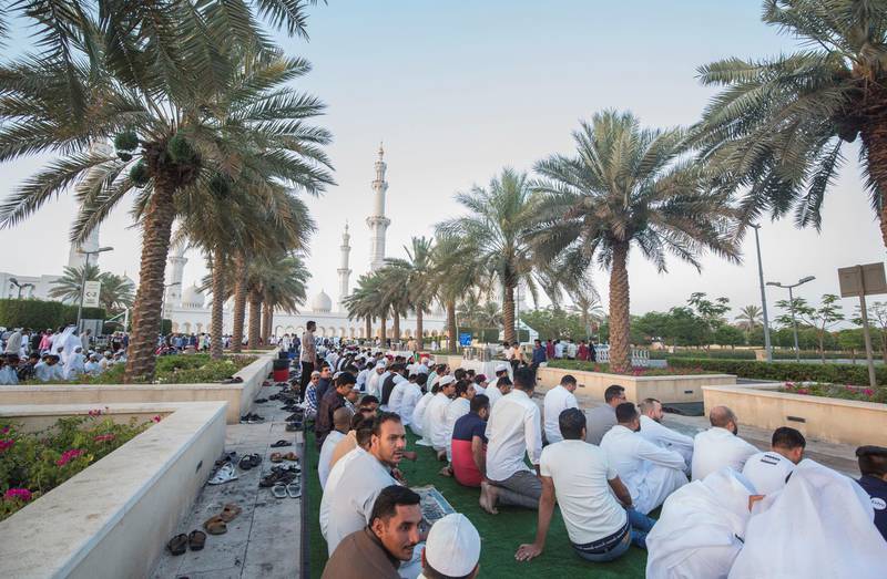 Abu Dhabi, UNITED ARAB EMIRATES - Faithfuls are waiting for the Eid prayer to start at the Sheikh Zayed Grand Mosque.  Leslie Pableo for The National
