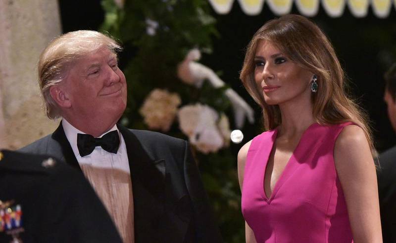 Donald Trump, pictured here with his wife, Melania Trump, on February 4, 2017. Reports Kuwait had 'mirrored' the US president's ban on travellers from seven mainly-Muslim countries prompted him to respond with 'Smart!'. Mandel Ngan / AFP