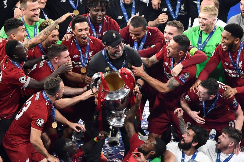 Jurgen Klopp and his Liverpool squad party with the European Cup after winning the Uefa Champions League final. AFP