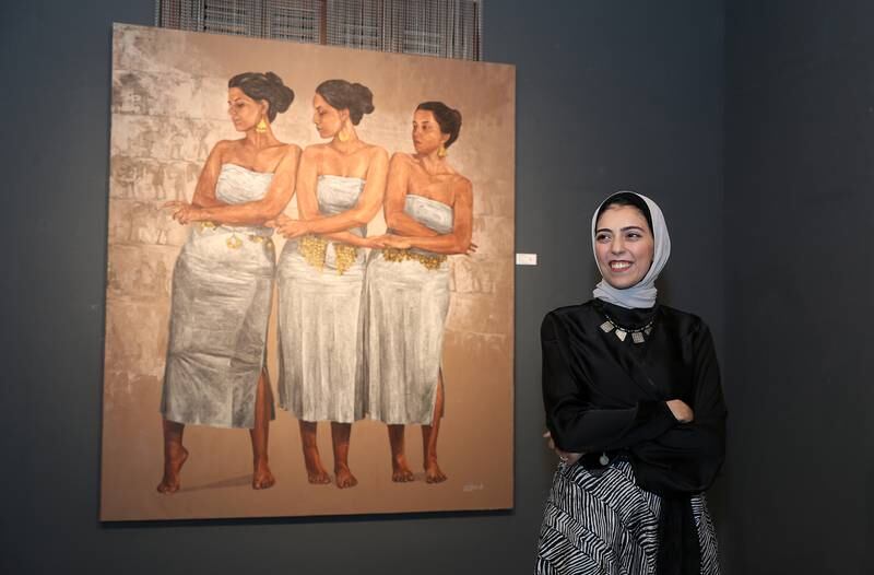 Sara Tantawy with her artwork at Fann A Porter in Dubai. All photos: Pawan Singh / The National