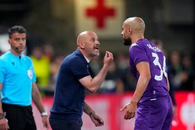 Fiorentina coach Vincenzo Italiano speaks to Sofyan Amrabat. AP 