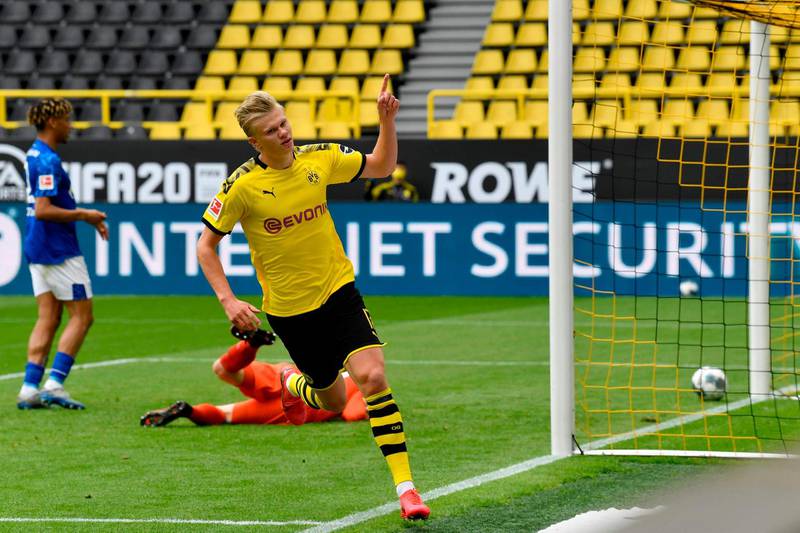 Burussia Dortmund forward Erling Braut Haaland celebrates after scoring the opening goal against Schalke at Signal Iduna Park on May 16. AFP