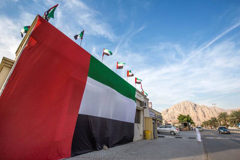 RAS ALKHAIMAH, UNITED ARAB EMIRATES - A building with UAE flags  and decorations in Ras Alkhaimah.  Leslie Pableo for The National for Ruba Haza’s story