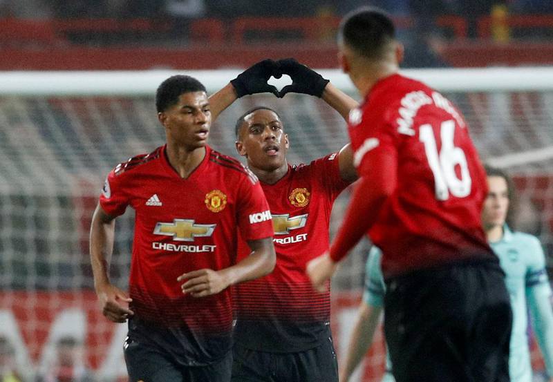 Manchester United's Anthony Martial celebrates scoring their first goal with Marcus Rashford. Reuters