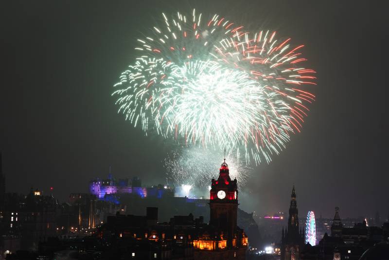 Fireworks explode over Edinburgh Castle during the street party for Hogmanay New Year celebrations, on January 1, 2023. PA