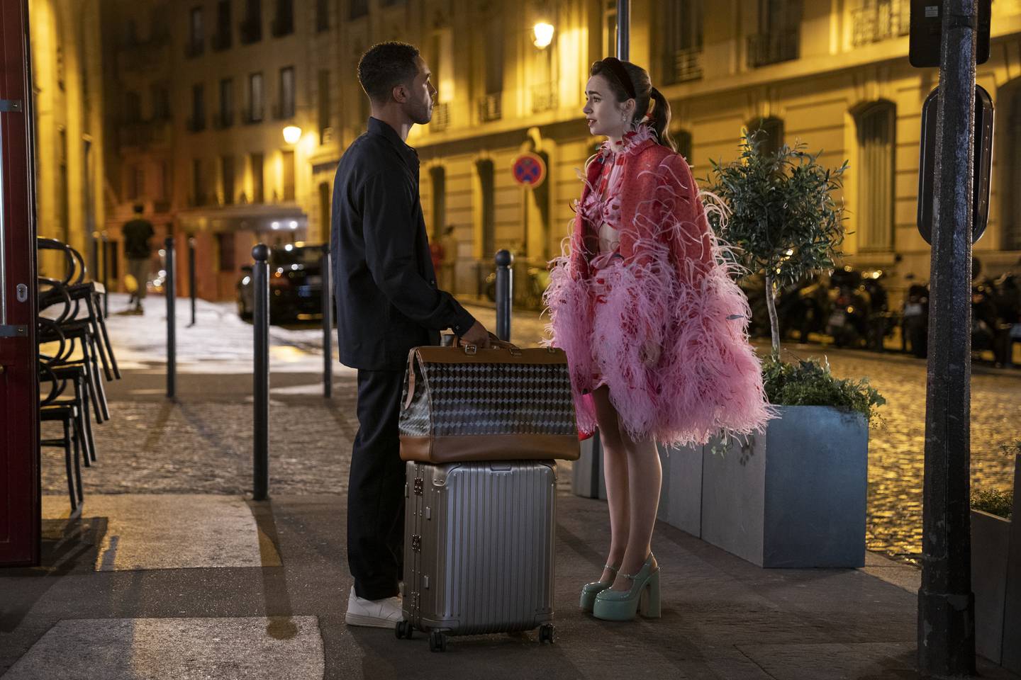 Lily Collins as Emily and Lucien Laviscount as Alfie in season three of Emily in Paris. Photo: Netflix