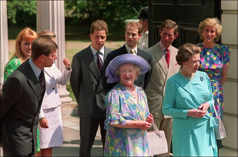 The Queen Mother poses outside her London Clarence House residence for photographers with Queen Elizabeth II and other members of the Royal Family on her 89th birthday, August 4, 1989. Left to right: Prince Andrew, Sarah Duchess of York, Lord Linley, Prince Edward, Prince Charles and Diana, Princess of Wales