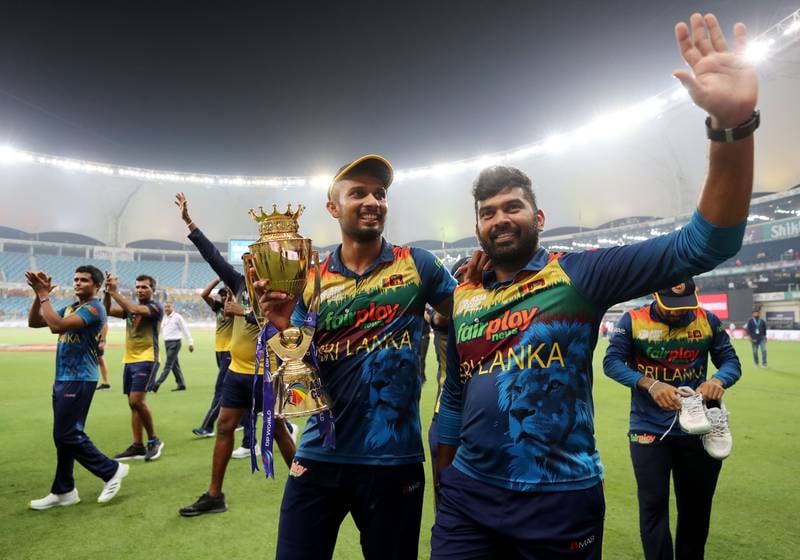Captain Dasun Shanaka (L) and man of the match Bhanuka Rajapaksa. Sri Lanka celebrate the win after the game between Pakistan and Sri Lanka in the final of the Asia Cup 2022. Sports City, Dubai. Chris Whiteoak / The National