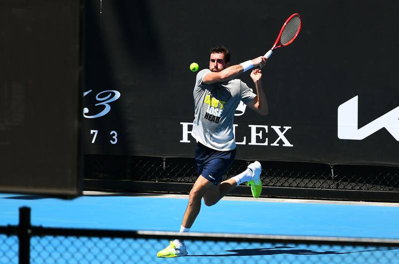 Croatia's Marin Cilic hits a return during a practise session in Melbourne on January 25, 2021, with players allowed to train while serving quarantine for two weeks ahead of the Australian Open. AFP