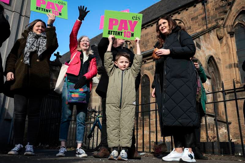 Striking teachers and supporters hold a rally in Glasgow. Getty Images