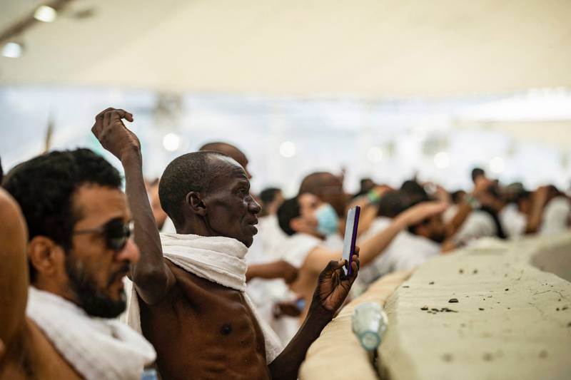 Pilgrims perform the stoning of the devil ritual as this year's expanded Hajj comes to an end. AFP