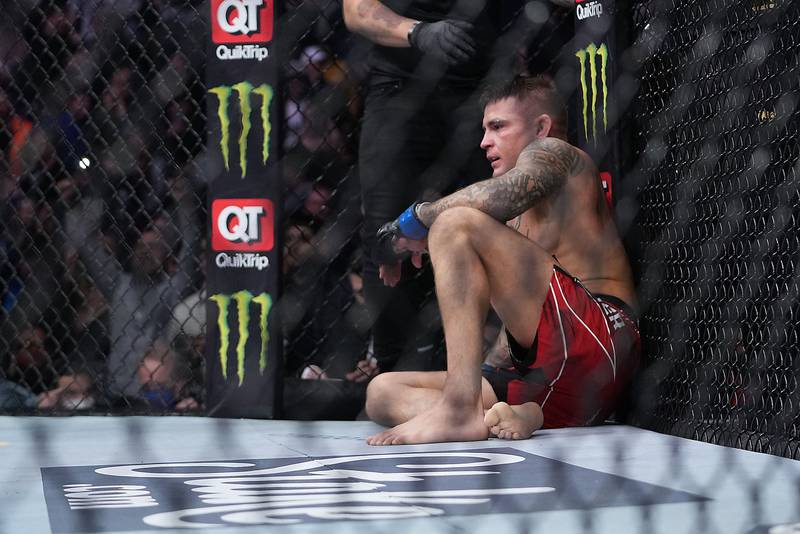 Dustin Poirier reacts following his loss by submission against Charles Oliveira. Reuters